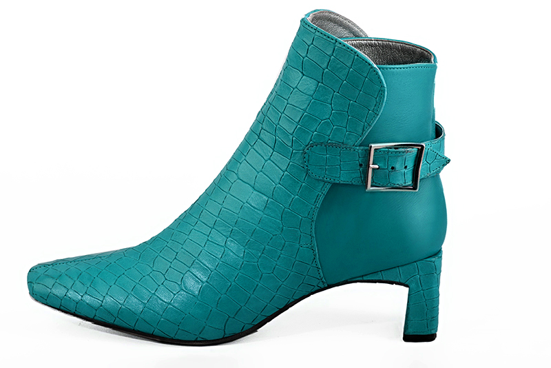Turquoise blue women's ankle boots with buckles at the back. Square toe. Medium flare heels. Profile view - Florence KOOIJMAN